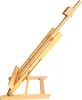 A wooden easel is shown against a white background. Produktbild-Vorschau