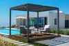 A modern outdoor living space with a pergola, swimming pool, and a house. Produktbild-Vorschau
