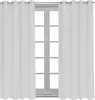Two white curtains are shown hanging on a curtain rod in front of a window with multiple panes. Produktbild-Vorschau
