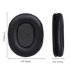 Two black ear pads for headphones are shown, with dimensions indicated. Produktbild-Vorschau