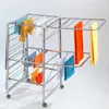 A mobile stainless steel clothes drying rack with various colored towels and clothes hanging on it. Náhled obrázku produktu