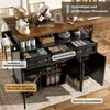 A kitchen island with various storage compartments and items displayed, highlighting its features. Náhled obrázku produktu