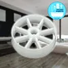 A white plastic component with spokes, possibly a filter or impeller, is shown in the foreground against a blurred background of a modern bathroom. Produktbild-Vorschau