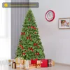 A decorated Christmas tree with presents underneath, in a room with a clock and a framed picture on the wall. Produktbild-Vorschau