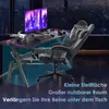 A gaming desk setup with a computer, keyboard, mouse, controllers, and a drone, set against a city skyline at night. Produktbild-Vorschau