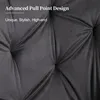 A close-up of a tufted gray fabric surface, likely a piece of furniture, with marketing text overlaid. Produktbild-Vorschau