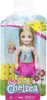 A Barbie Club Chelsea doll in its packaging, with a backdrop depicting a sunny day with clouds and a fence. Podgląd zdjęcia produktu