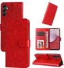 A collage of images showing a red flip phone case with a sunflower embossed pattern, displaying its features and how it can be used. Produktbild-Vorschau