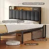 A split image showing the headboard and underbed storage of a bed frame, with a robot vacuum cleaner and storage baskets. Voir les images du produit