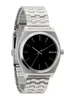 A studio shot of a silver Nixon Time Teller watch with a black face. Produktbild-Vorschau