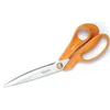 A pair of orange-handled Fiskars scissors on a white background. Podgląd zdjęcia produktu