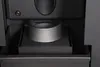 A close-up view of a metal component inside a heating appliance. Produktbild-Vorschau