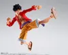 A dynamic action shot of a Monkey D. Luffy action figure in mid-air. Podgląd zdjęcia produktu