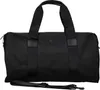 A black duffel bag with black straps and black leather accents, featuring a small black crocodile logo on the front. Produktbild-Vorschau
