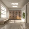 A hallway with lockers and a bench, illuminated by natural light from windows and ceiling lights. Produktbild-Vorschau