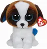 A plush toy dog sitting on a white background. Produktbild-Vorschau