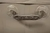 A close-up view of a handle and straps on a beige inflatable product. Produktbild-Vorschau