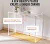 A clear acrylic console table is shown against a white wall with text overlays highlighting its features. Náhled obrázku produktu