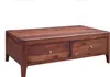 A wooden coffee table with two drawers against a white background. Produktbild-Vorschau