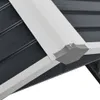 A close-up view of the corner joint of a metal structure, likely a shed or garage, showing the interlocking parts and a screw. Produktbild-Vorschau