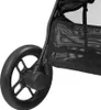 A close-up of a black stroller wheel and part of the storage basket. Produktbild-Vorschau