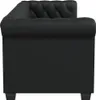 A side view of a black Chesterfield sofa. Produktbild-Vorschau