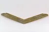 A corner piece of a picture frame is shown against a white background. Produktbild-Vorschau