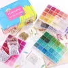 A collection of beads and jewelry-making supplies, including various colors of small glass beads, charms, chains, and a box with the 'FUNTOPIA' logo. Produktbild-Vorschau