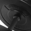 A close-up shot of a black weight plate with the brand name 'GYMTEK' embossed on it, attached to a dumbbell handle. Náhled obrázku produktu