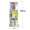 A white, rotating bookshelf with books and decorative items on its shelves, shown against a white background with measurement annotations. Produktbild-Vorschau
