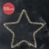 A star-shaped LED light decoration against a dark, textured background. Produktbild-Vorschau