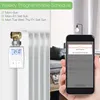 A smart thermostat attached to a radiator, with a smartphone displaying its app interface in the foreground. Podgląd zdjęcia produktu