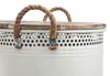 A close-up view of the top of a white laundry basket with a wooden lid and rope handles. Náhled obrázku produktu