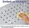 A hand is cleaning a shower head with a yellow cloth. The shower head has many small nozzles. Náhľad obrázku produktu