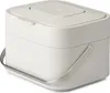 A white compost bin with a silver handle is shown against a white background. Voir les images du produit