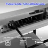 A close-up view of a power strip with multiple outlets and USB ports, integrated into a desk. Náhled obrázku produktu
