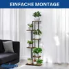 A multi-tiered plant stand filled with various plants is shown in a living room setting next to a sofa. Produktbild-Vorschau