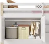 A close-up view of the interior of a white wooden loft bed's storage cabinets, showing storage bins, hanging clothes, and decorative cloud items. Náhled obrázku produktu