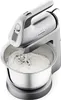 A silver Kenwood hand mixer with a stainless steel bowl filled with whipped cream. Produktbild-Vorschau