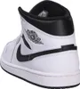 A rear side view of a white and black Nike Air Jordan 1 Mid sneaker. Anteprima dell’immagine prodotto