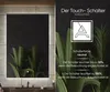 A modern bathroom mirror with integrated LED lighting, surrounded by lush green plants, with text overlays describing its features. Produktbild-Vorschau
