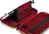 An open protective case for a portable game console, showing its interior compartments for games and accessories. Anteprima dell’immagine prodotto