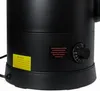A close-up view of the lower section of a black appliance, showing warning labels and a temperature control dial. Produktbild-Vorschau