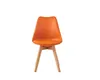 An orange chair with wooden legs against a white background. Anteprima dell’immagine prodotto