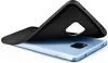 A black phone case is shown being placed onto a light blue smartphone. Náhled obrázku produktu