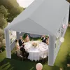 People are dining under a gray party tent in a garden setting. Produktbild-Vorschau