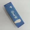 A close-up of a blue Oral-B packaging flap with some white peeling off. Produktbild-Vorschau