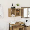 A bathroom scene featuring a wall-mounted cabinet and a vanity with a sink. Anteprima dell’immagine prodotto