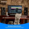 A studio monitor setup with a computer, keyboard, and chair. Voir les images du produit