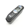 A black Braun ear thermometer rests in its black charging cradle against a white background. Produktbild-Vorschau